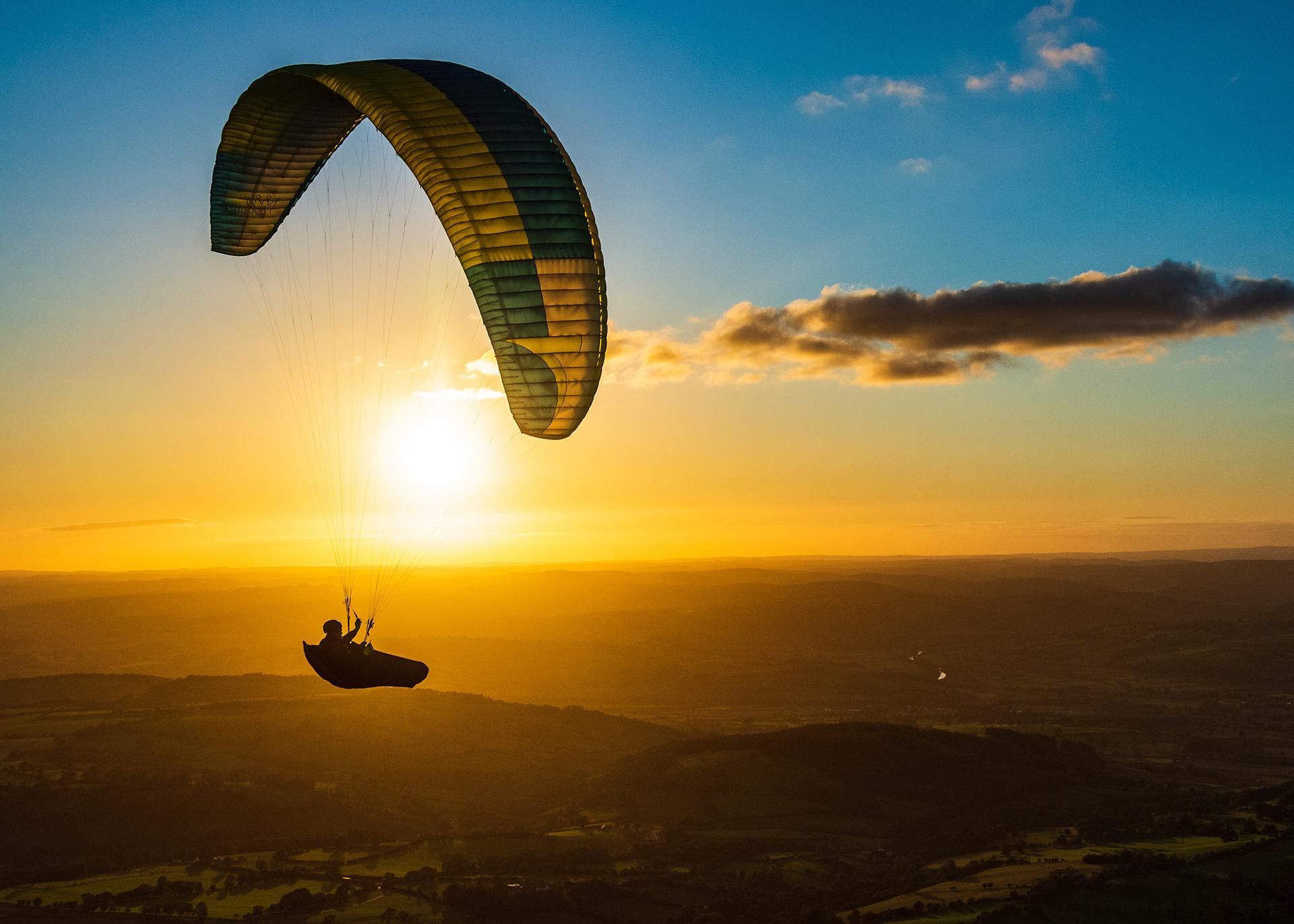 Paragliding over sunset